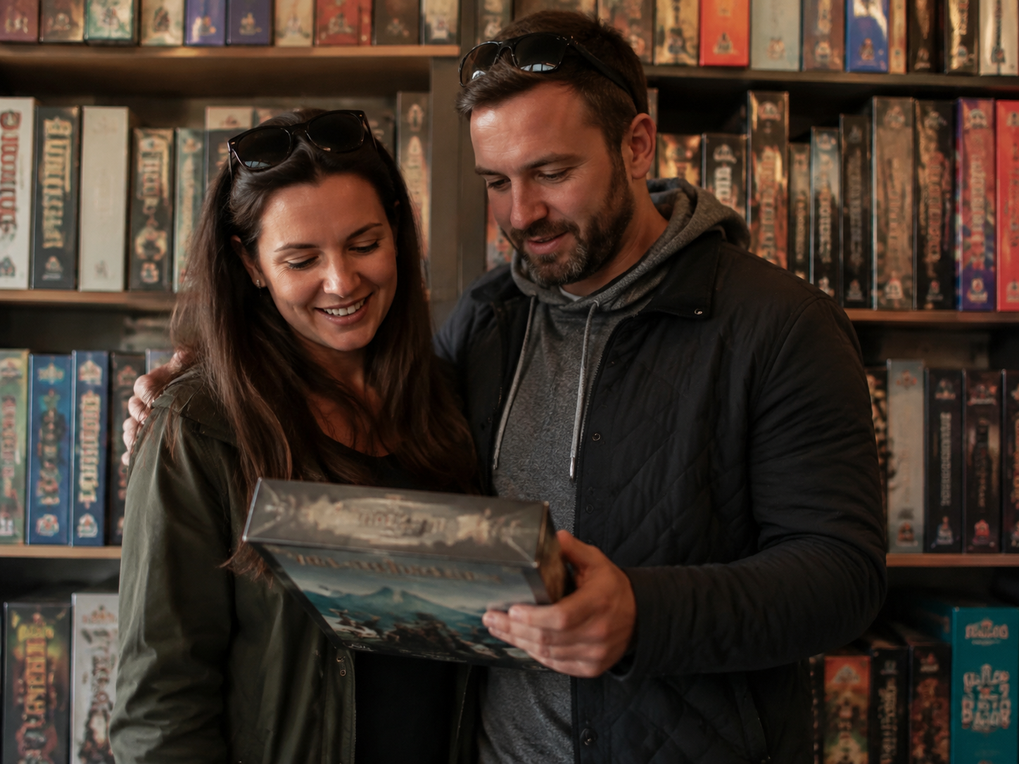 Adult couple selecting board games together
