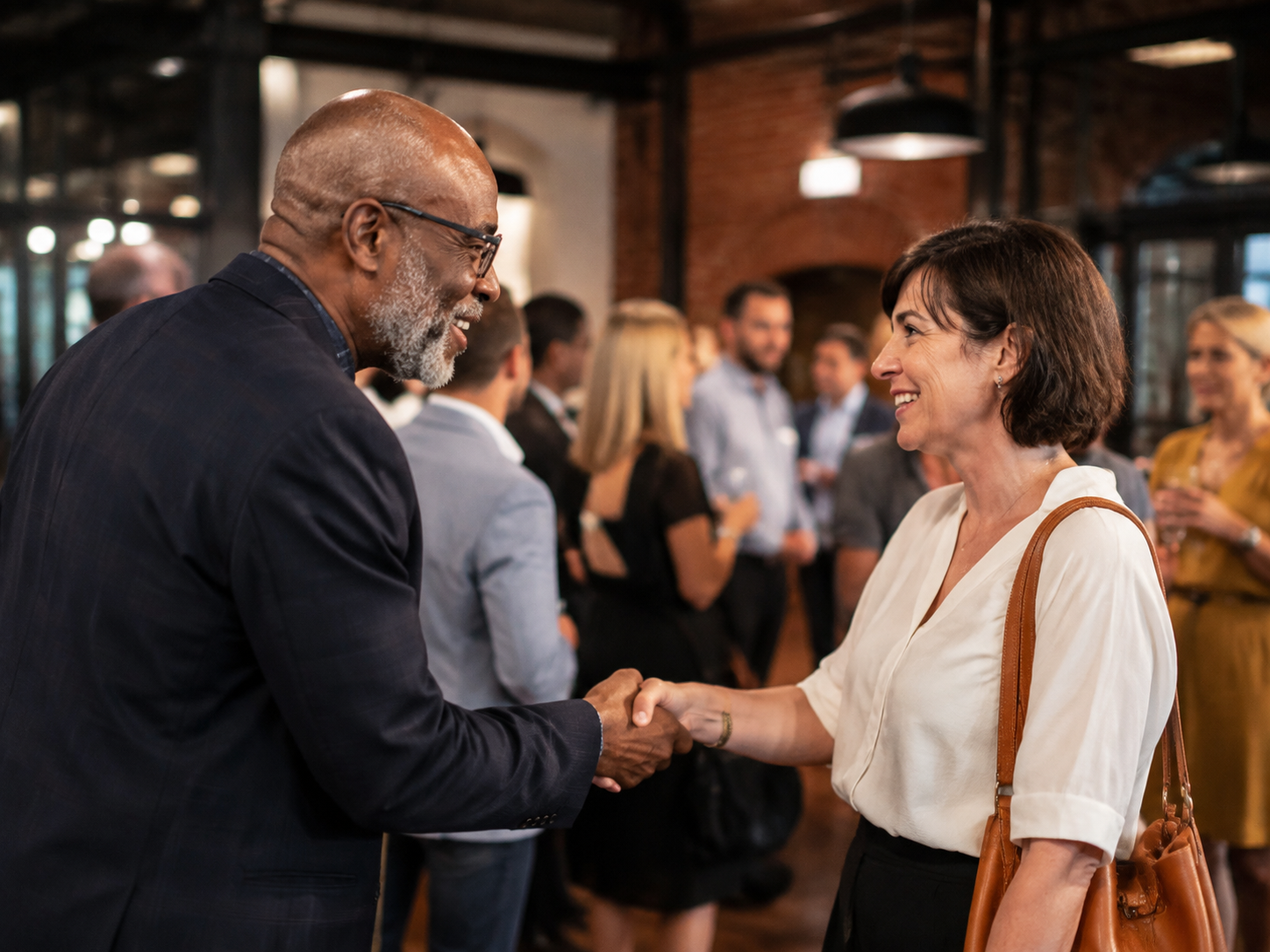 Adults greeting at a small public business meetup