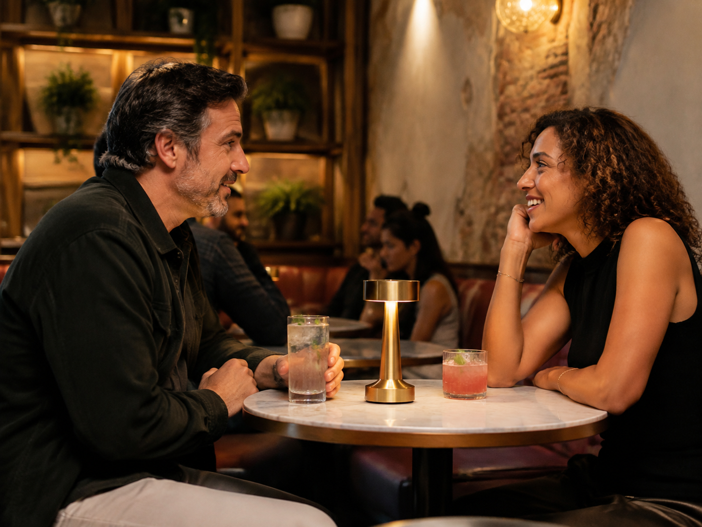 Adults chatting at a stylish alcohol-free cocktail bar