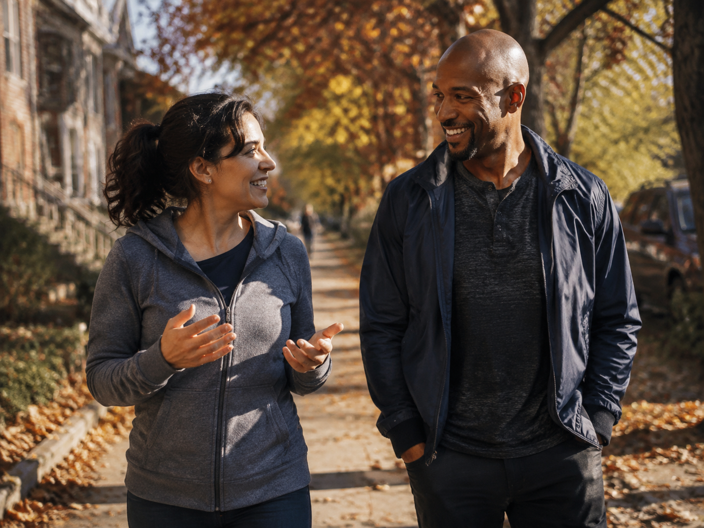 Adults talking during a neighborhood morning walk
